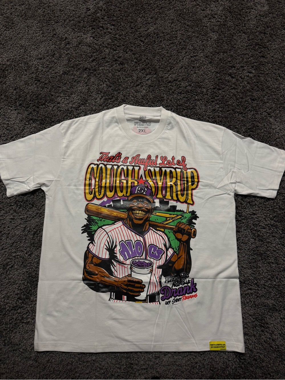 Men's White Graphic Tee with Purple & Yellow 'Cough Syrup' Illustration